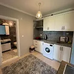 Next Apartman *